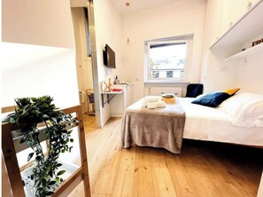 1 Schlafzimmer, Bügeleisen/Bügelbrett, kostenloses WLAN, Bettwäsche