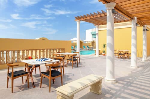 Outdoor pool, pool umbrellas, pool loungers