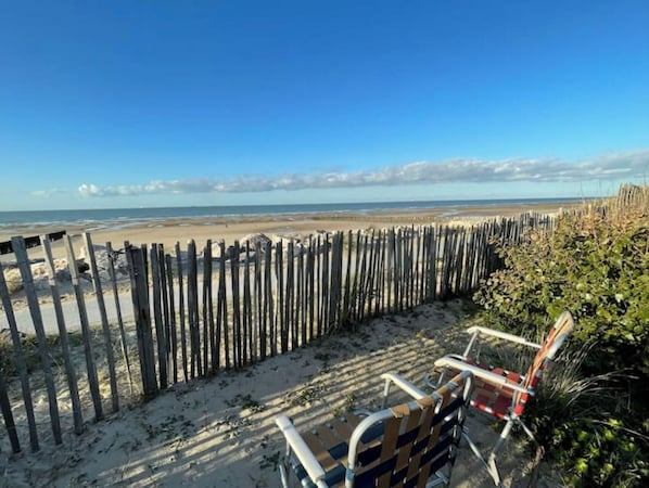 On the beach, sun-loungers