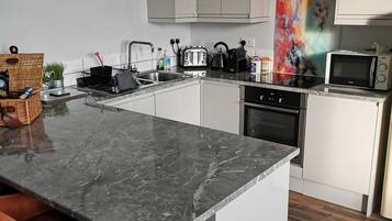 Apartment | Private kitchen | Fridge, microwave, oven, stovetop