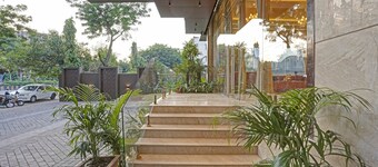 特里博高級黃金幸福特里穆爾蒂那加爾廣場飯店