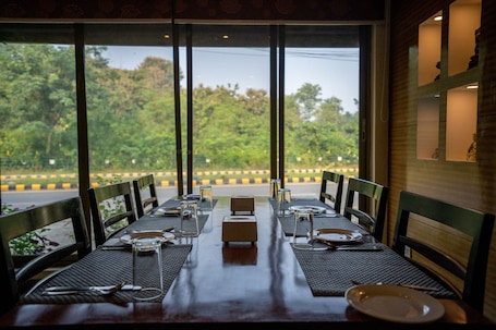 Breakfast, lunch served; local and international cuisine, garden views