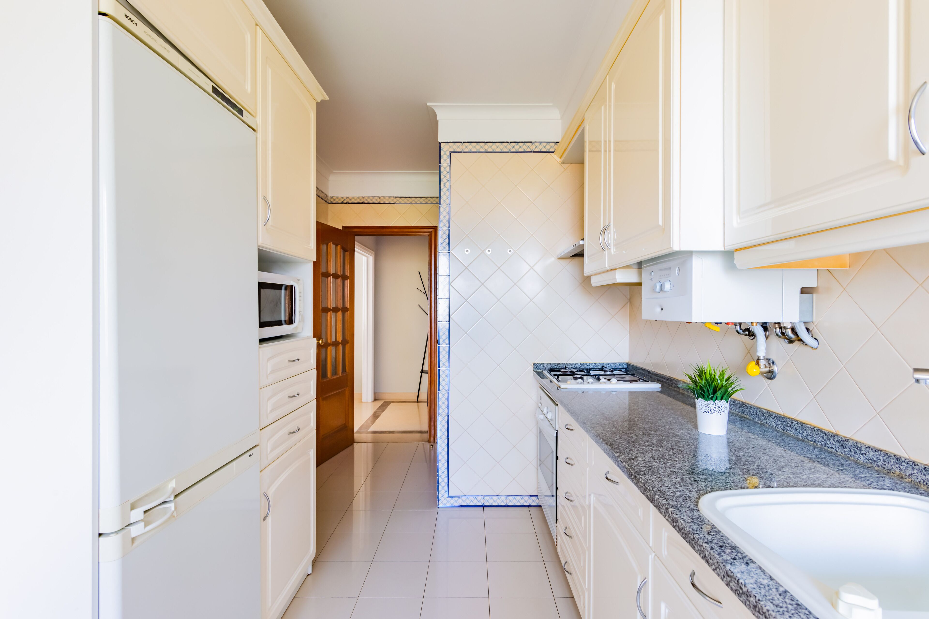 Apartamento, 2 baños | Cocina privada | Frigorífico, microondas, horno y placa de cocina