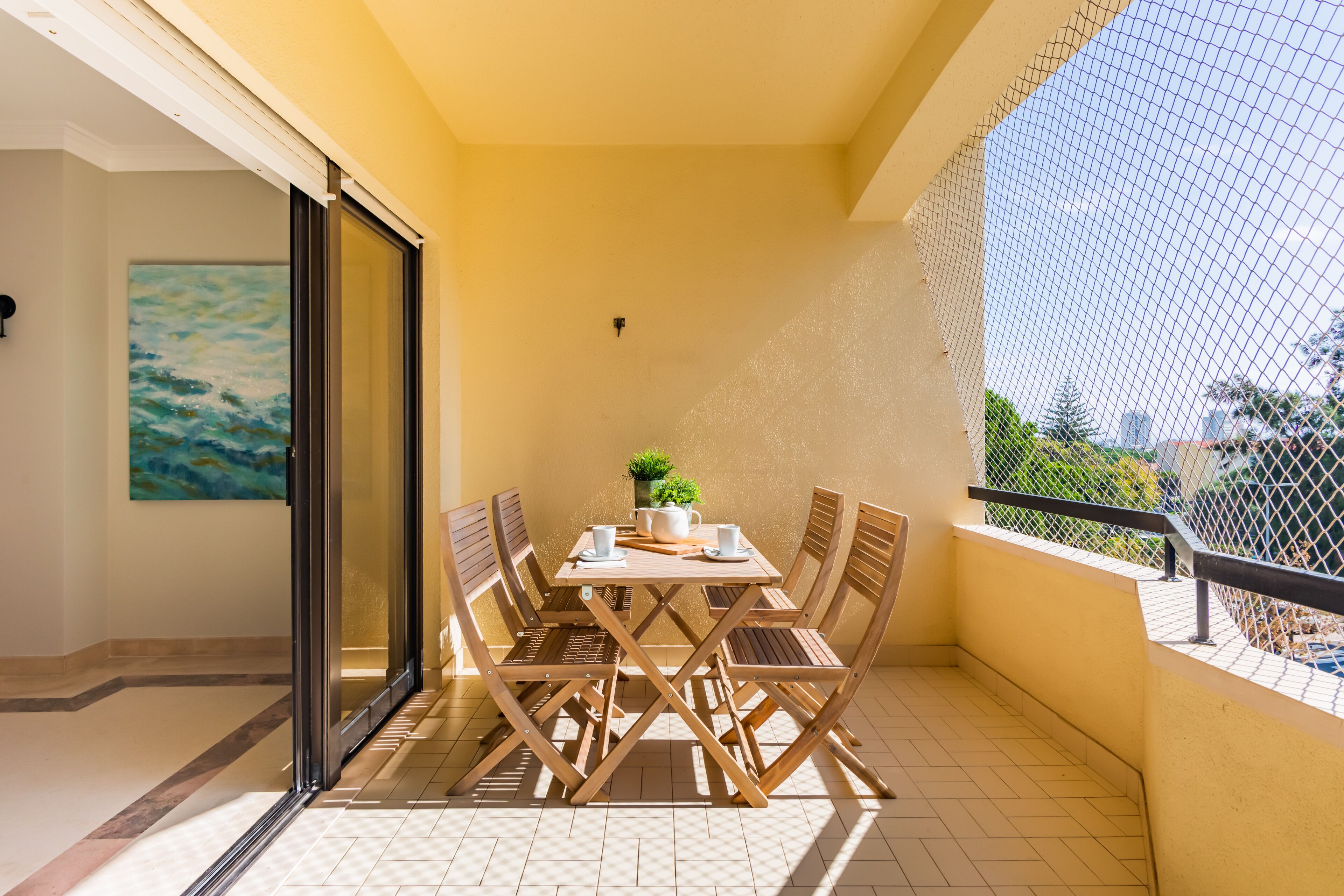 Apartment, 2 Bathrooms | Living area | 32-inch TV with cable channels