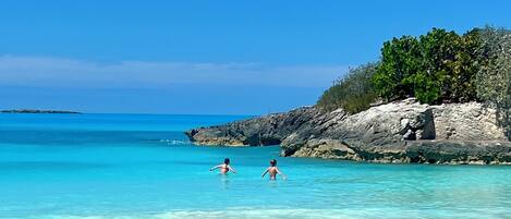 On the beach, sun loungers, beach towels