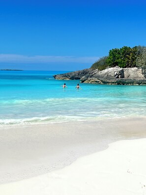 On the beach, sun loungers, beach towels