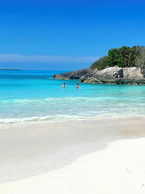 On the beach, sun-loungers, beach towels