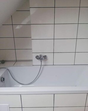 Een bad/douchecombinatie