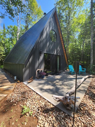 The Acorn of Little Sand Bay
Secluded, Wooded, and Dog Friendly!