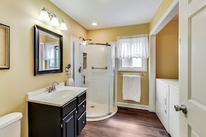 Combined shower/tub, hair dryer, towels, soap