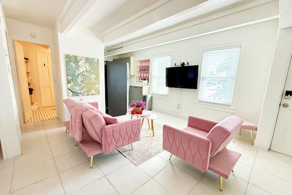The newly renovated home features a cozy sitting area in the living room.