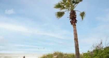 Stay steps from the sand in this charming single-family home. Enjoy exclusive beach access at Sunburst Inn, featured on HGTV. Cozy comfort for up to 4, and an unbeatable location on the Gulf. Perfect for a romantic escape or small family getaway.