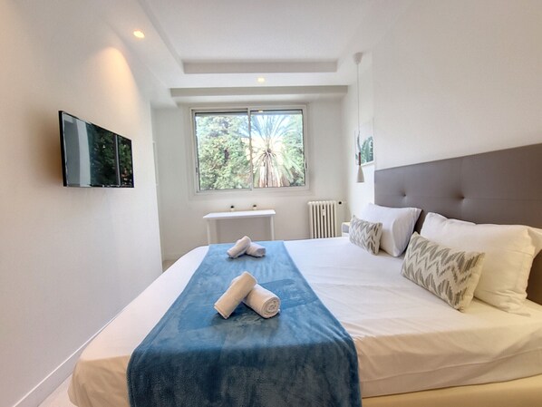 2 habitaciones, tabla de planchar con plancha y internet gratis 