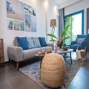 Presidential Suite | Living area | 50-inch Smart TV with digital channels, TV