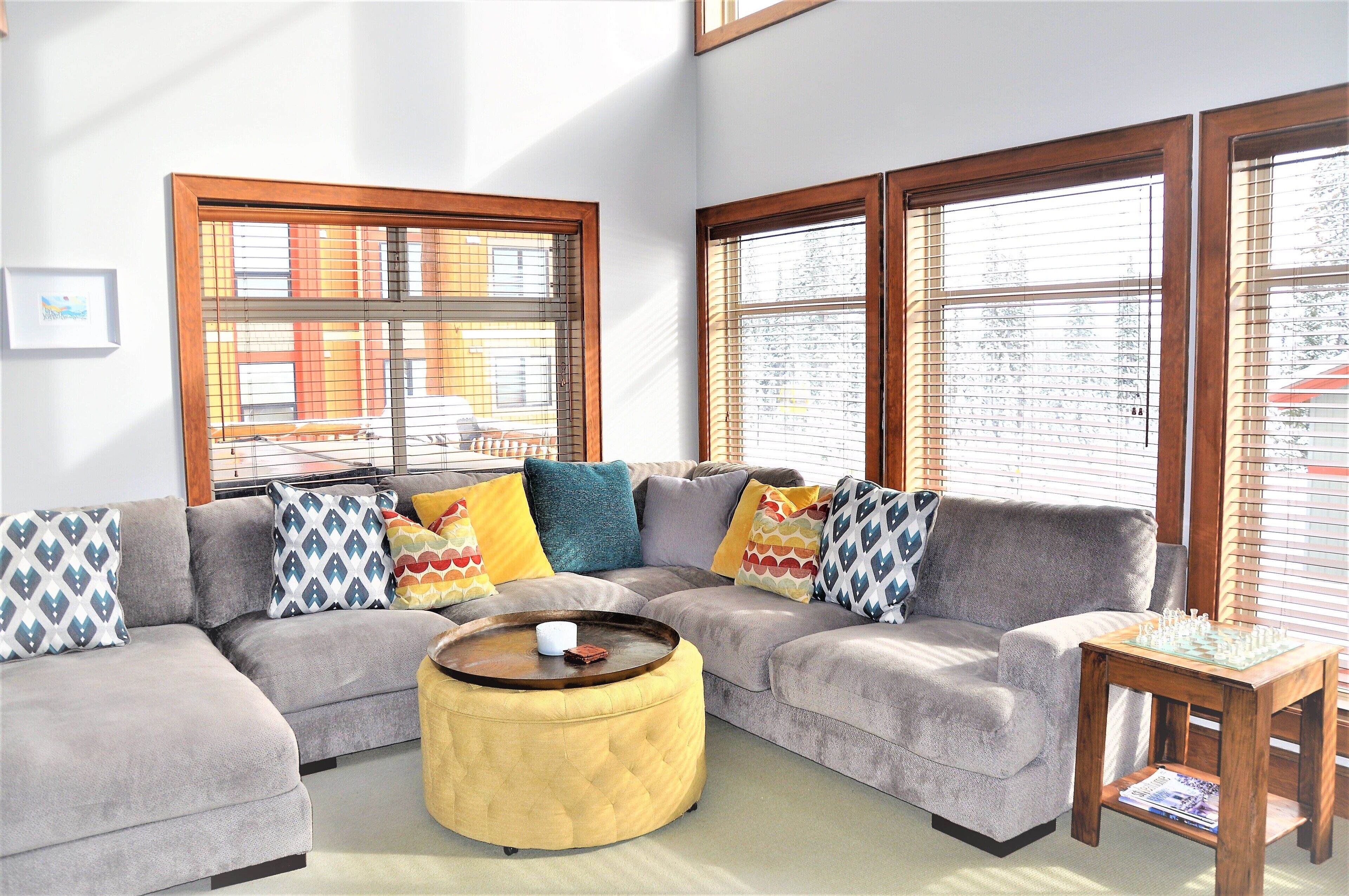 Huge living room with lots of seating and views of the Gondola and Happy Valley
