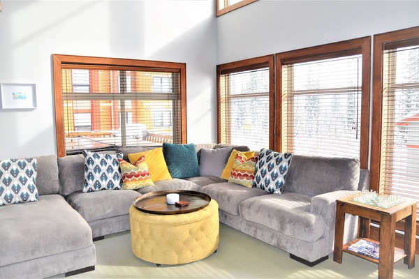 Huge living room with lots of seating and views of the Gondola and Happy Valley