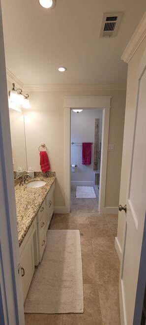 Combined shower/tub, hair dryer, towels, soap