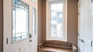 Apartment | Living area | 40-inch flat-screen TV with cable channels, TV, fireplace