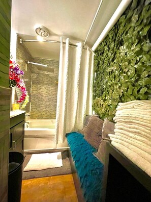Combined shower/tub, jetted tub