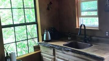 Fridge, stovetop, electric kettle, toaster