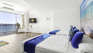 Standard Quadruple Room, 1 Bedroom, Beach View | Individually decorated, free WiFi, bed sheets - Suites Torres Gemelas VIP (Acapulco)