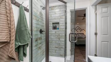 Shower, hair dryer, towels, soap