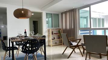 Family Apartment | Living area | 32-inch Smart TV with cable channels, TV