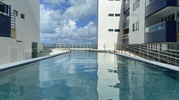 Outdoor pool, pool umbrellas, pool loungers