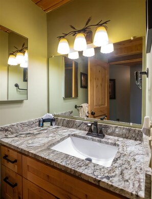 Hair dryer, towels, shampoo, toilet paper