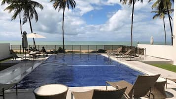 Outdoor pool, pool umbrellas, pool loungers