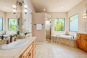 Combined shower/bathtub, hair dryer, towels, soap