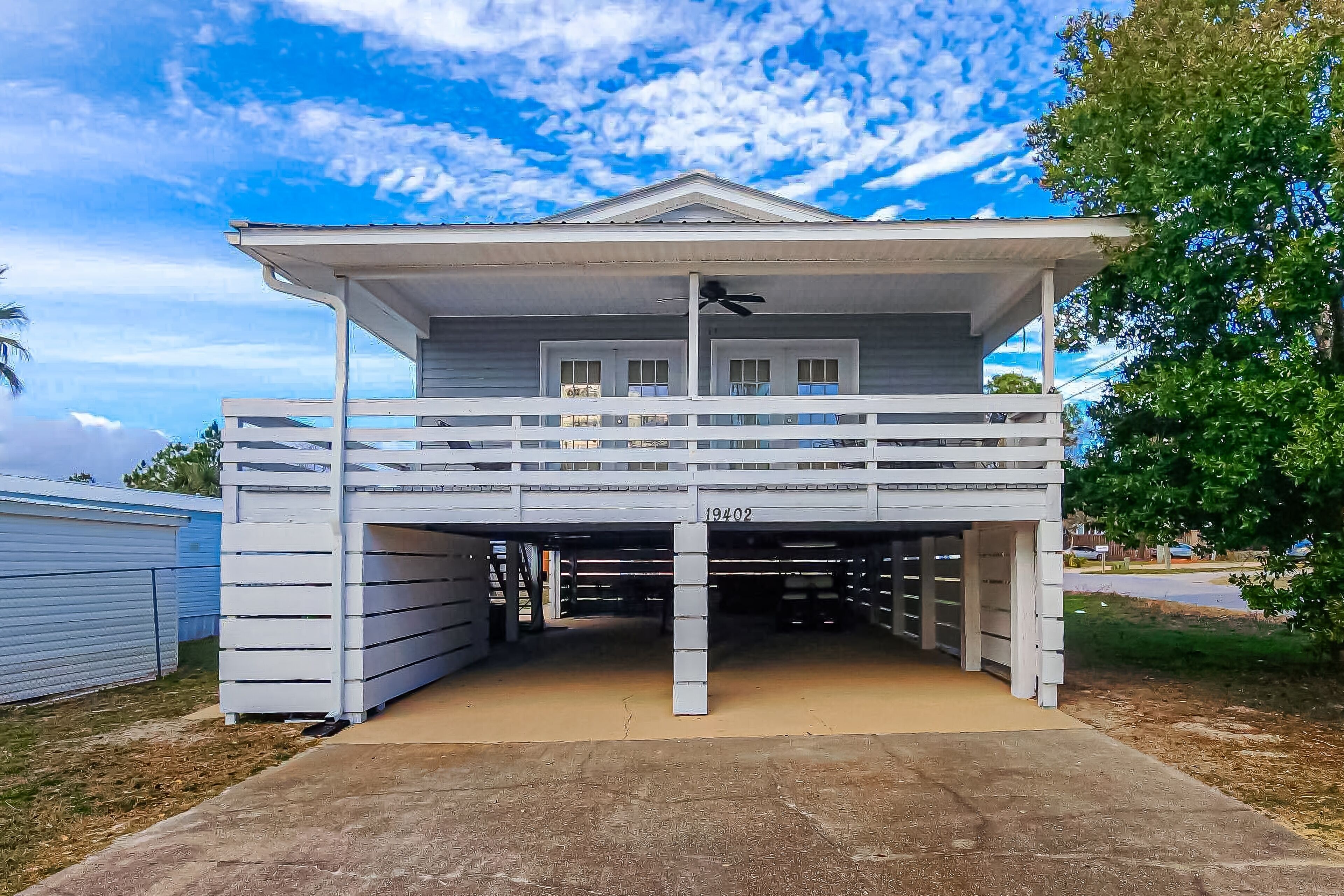 Coastal dog-friendly house with golf cart, balcony, central AC, & washer/dryer