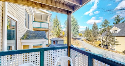 Ski-in/ski-out condo with deck, wood-burning fireplace, & community amenities