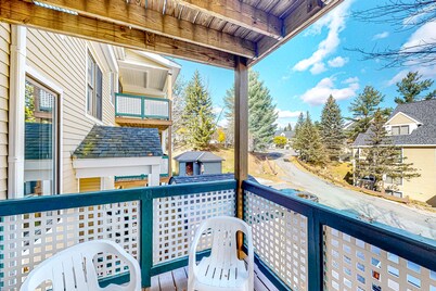 Ski-in/ski-out condo with deck, wood-burning fireplace, & community amenities