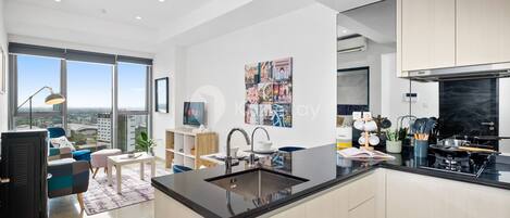 公寓, 1 间卧室, 城市景观 | 私人厨房 | 高脚椅、厨具/餐具、餐桌