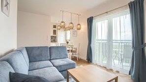 Apartamento (11) | Área de estar | TV de tela plana