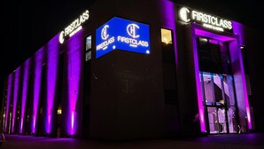 A building with illuminated signs reading "FIRSTCLASS" and "EVENT & HOTEL". - Firstclass Event & Hotel (Fuerth)