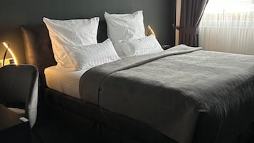 Habitación doble Deluxe | Ropa de cama de alta calidad, wifi gratis y ropa de cama