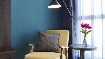 Deluxe Double or Twin Room | Living area | 110-cm plasma TV with digital channels, TV