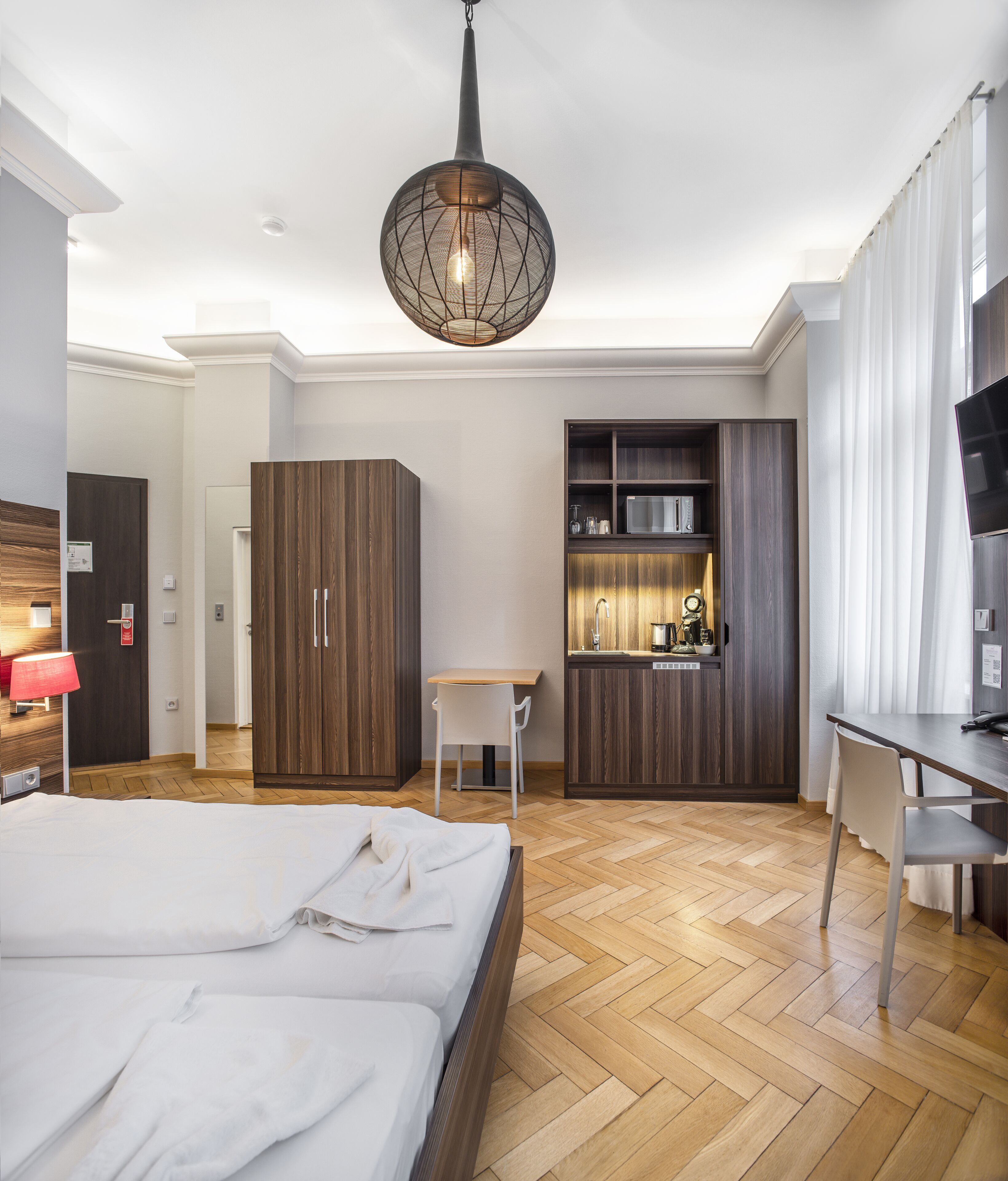 Hypo-allergenic bedding, desk, laptop workspace, free WiFi
