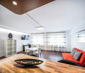 32-inch flat-screen TV with cable channels, TV