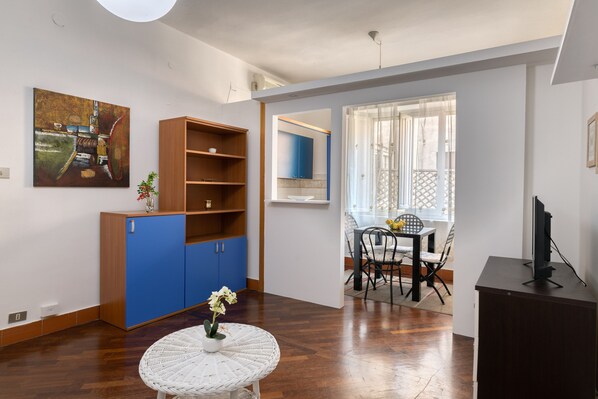 City Apartment | Living area | 49-inch plasma TV with cable channels, TV