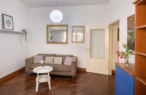 City Apartment | Living area | 49-inch plasma TV with cable channels, TV