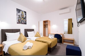 Standard Twin Room | 1 bedroom, in-room safe, desk, laptop workspace