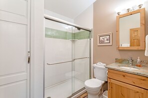 Shower, eco-friendly toiletries, towels, soap