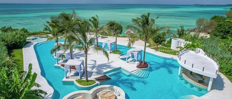 Outdoor pool, open 7:00 AM to 7:00 PM, free pool cabanas, pool umbrellas