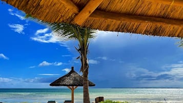Private beach, white sand, free beach cabanas, sun loungers