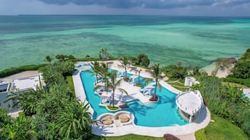 Outdoor pool, open 7:00 AM to 7:00 PM, free pool cabanas, pool umbrellas
