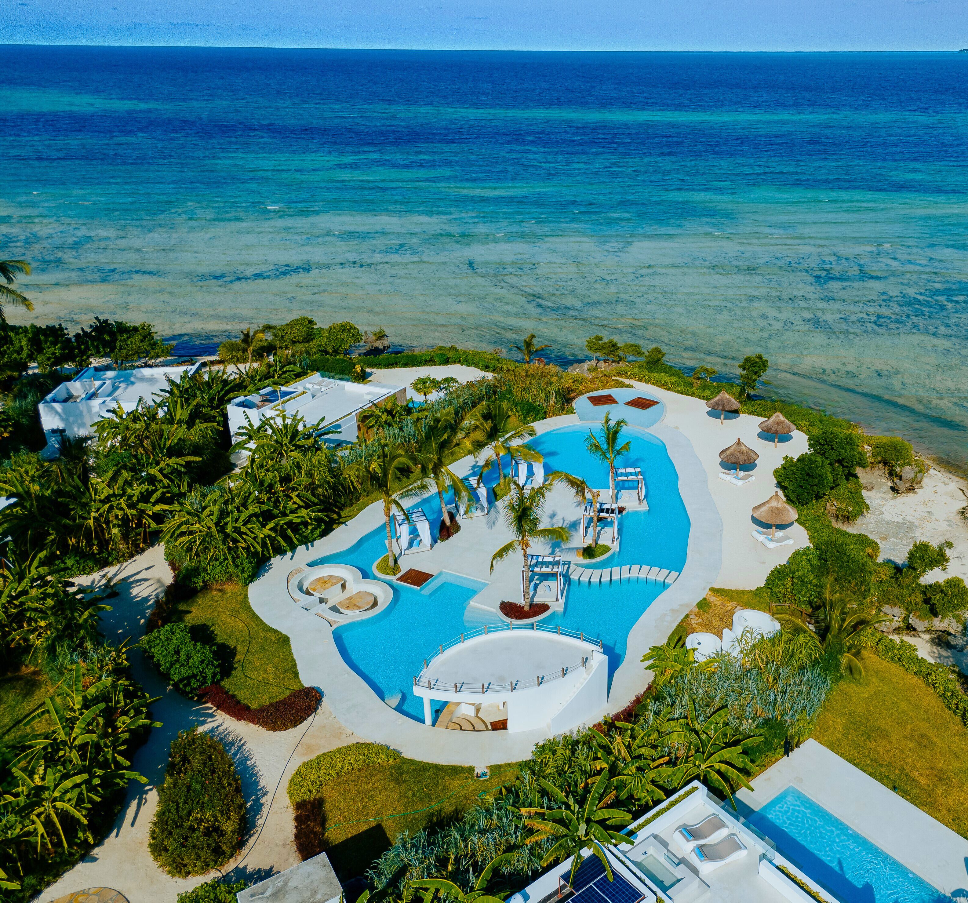 Outdoor pool, open 7:00 AM to 7:00 PM, free pool cabanas, pool umbrellas