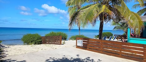 On the beach, sun-loungers, beach towels